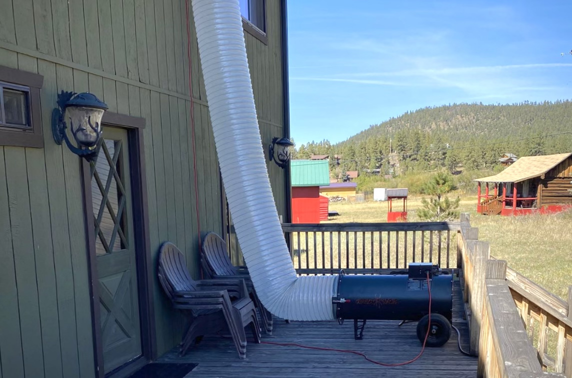 Professional bed bug treatment equipment set up outside a home